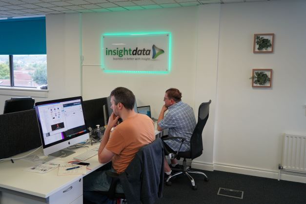 Email marketing executives working at Insight Data HQ