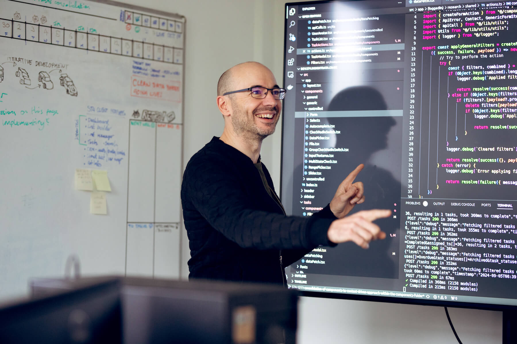 Insight Data employee discussing CRM software