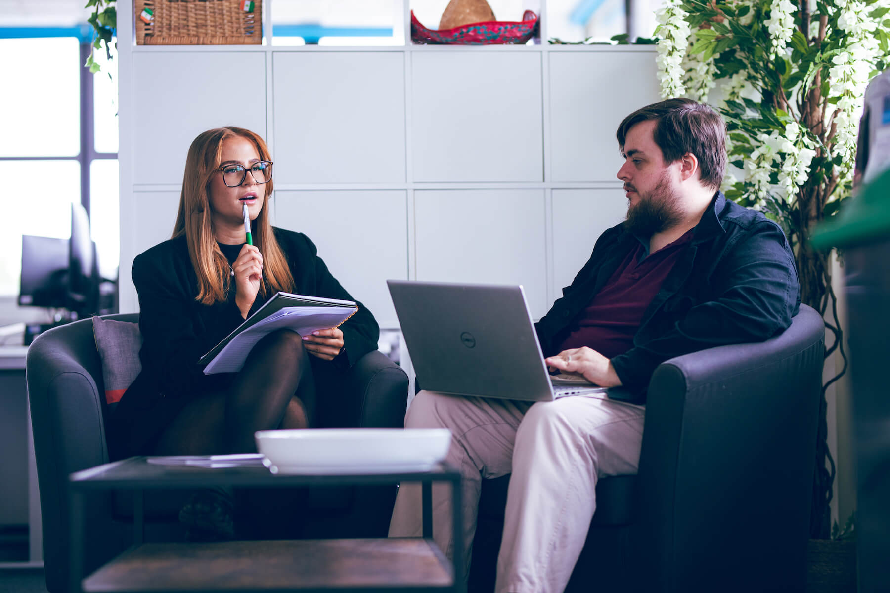 Elle and James discussing market intelligence solutions and lead generation strategies at Insight Data.