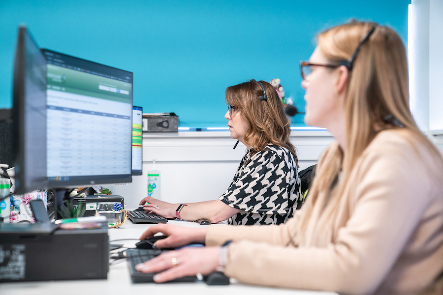 Insight Data employees working with Salestracker