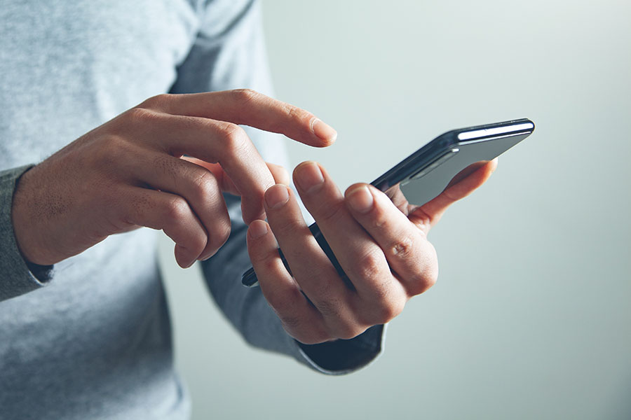 Holding mobile phone