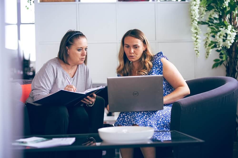 Insight Data team working together in office meeting
