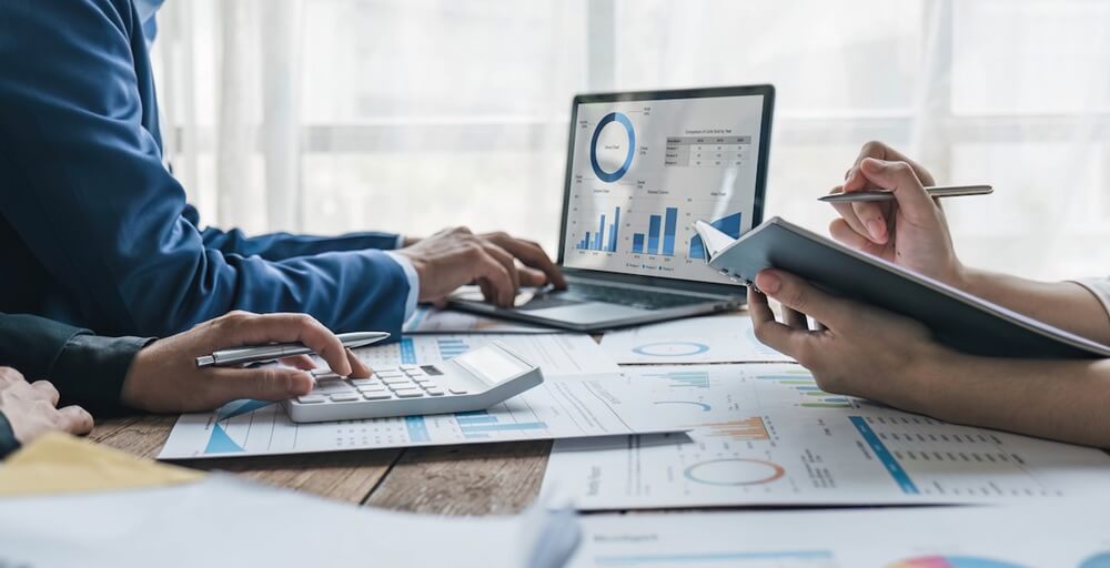 Targeted marketing professionals analysing live campaign data